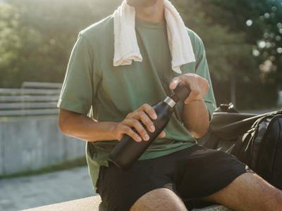 Water bottle and towel in a fitness studio